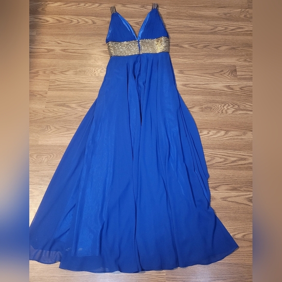 Elegant Blue Evening Gown with Gold Beading by Scala - Picture 15 of 16